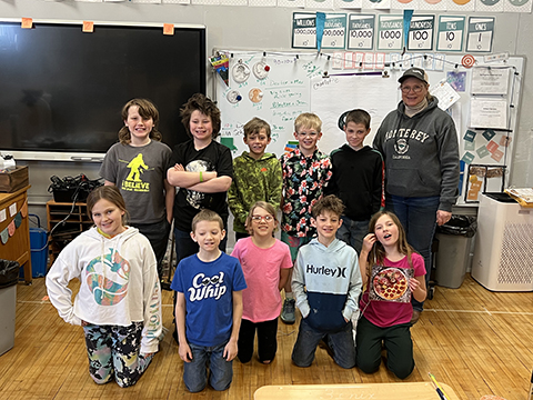 Bottineau County Farm Bureau explained where pizza ingredients come from at local schools for NDFB Week