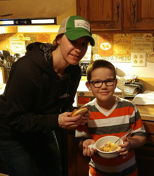 Carie and son eating eggs