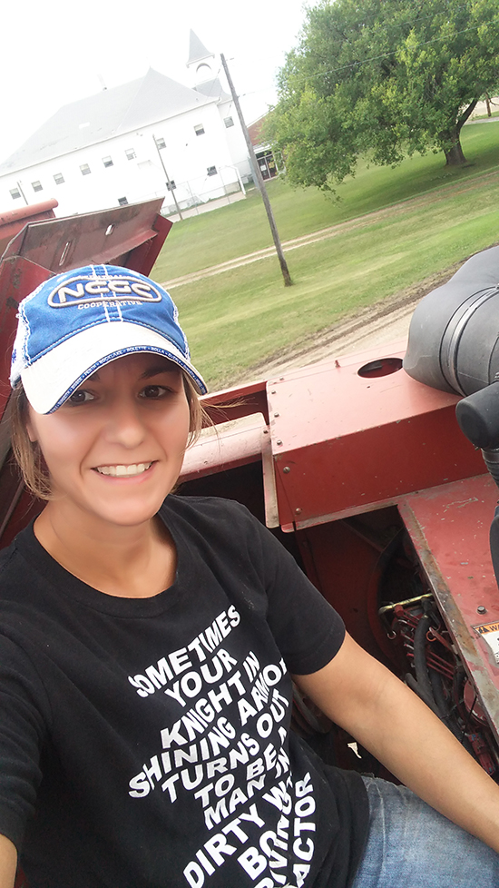 Carie preparing the combine for harvest