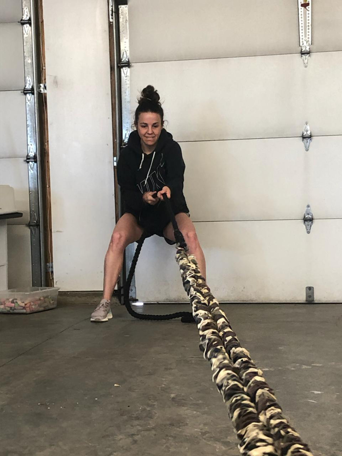 Elizabeth working out in the garage.