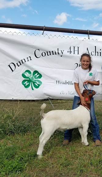 daughter and market goat