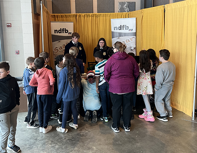 Granville FFA students talk to fourth graders about sugarbeets