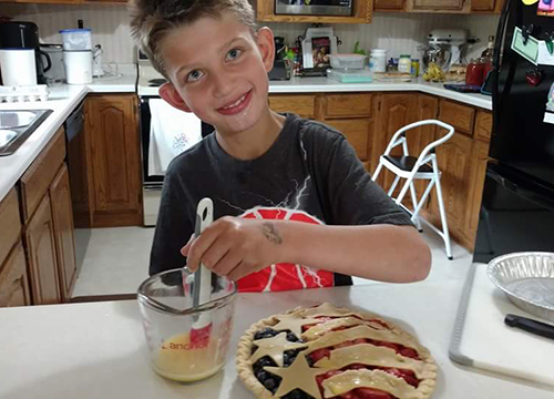Austin helps Grandma with her 4th of July pie