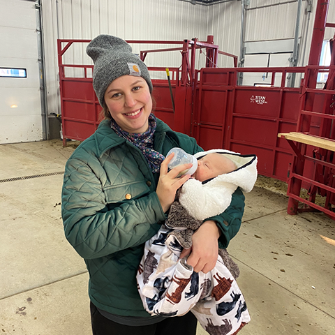 Abigail and son in the barn