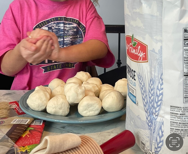 rolling dough balls for lefse